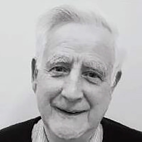 Black and white image of Circle's Patron Father Pat Carolan