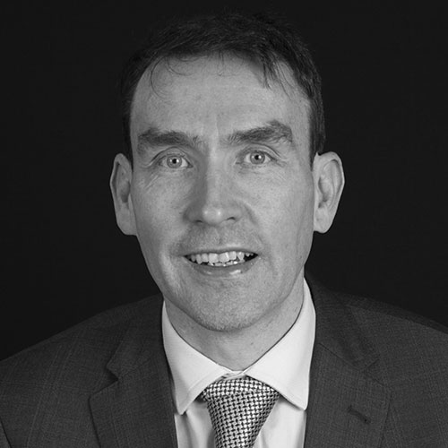 Black and white image of Director of Finance and Corporate Services in Circle Voluntary Housing Association Colin Creedon